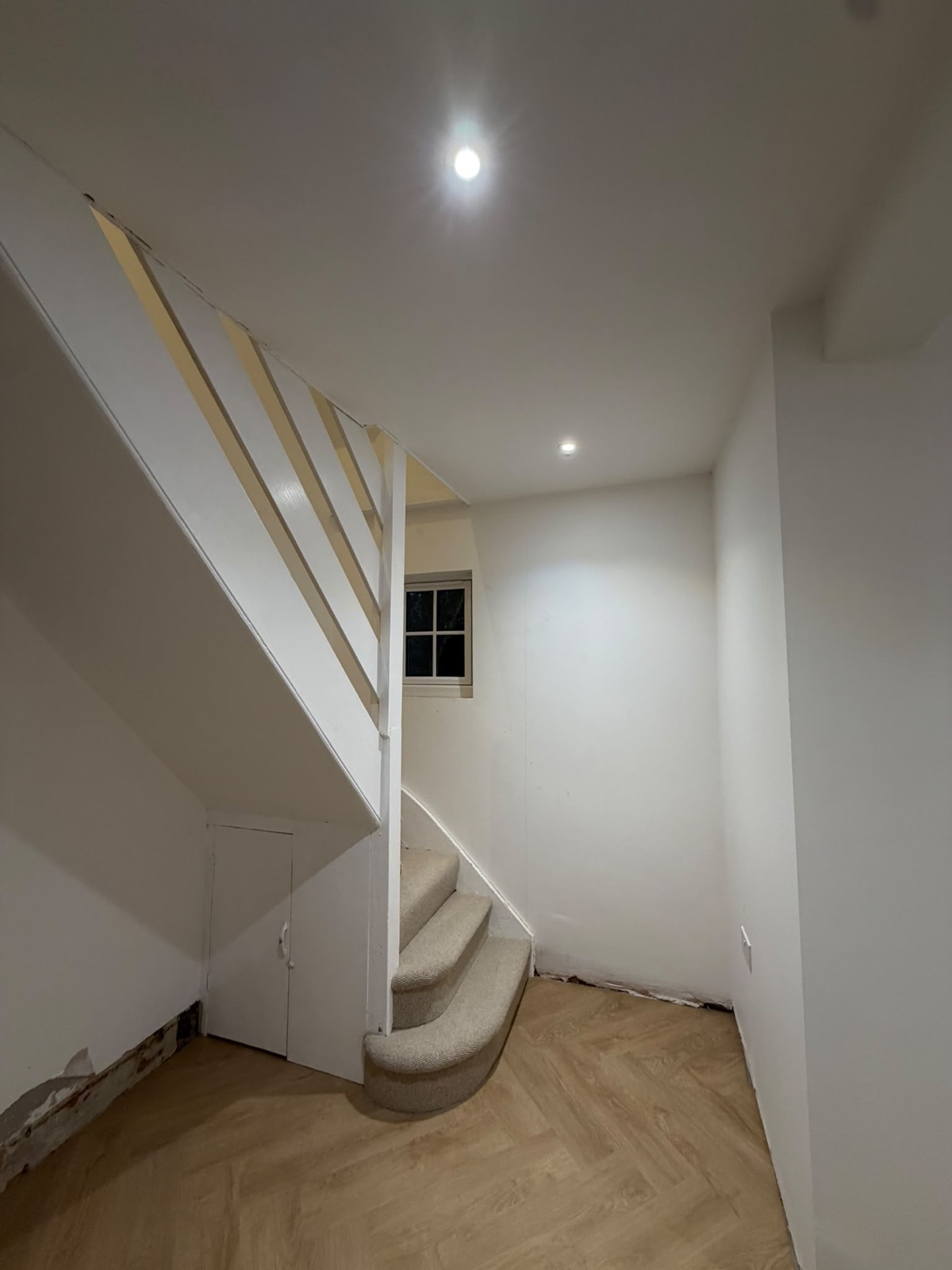 Staircase with recessed downlighting